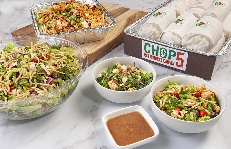 CHOP5 catering picture with wraps, salads and crave-a-bowls.